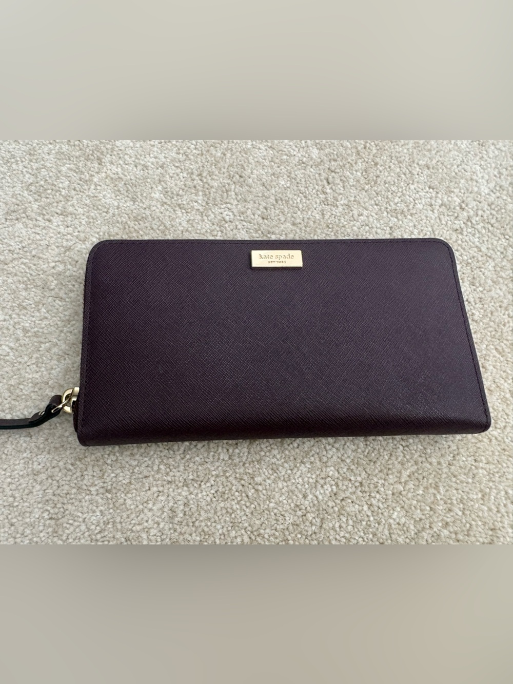 Kate Spade Continental Wallet in Plum with Gold accent.